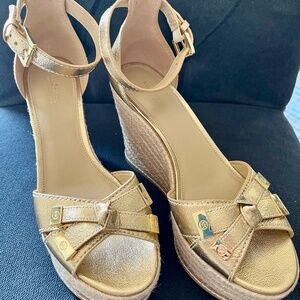 Michael Kors gold leather wedges